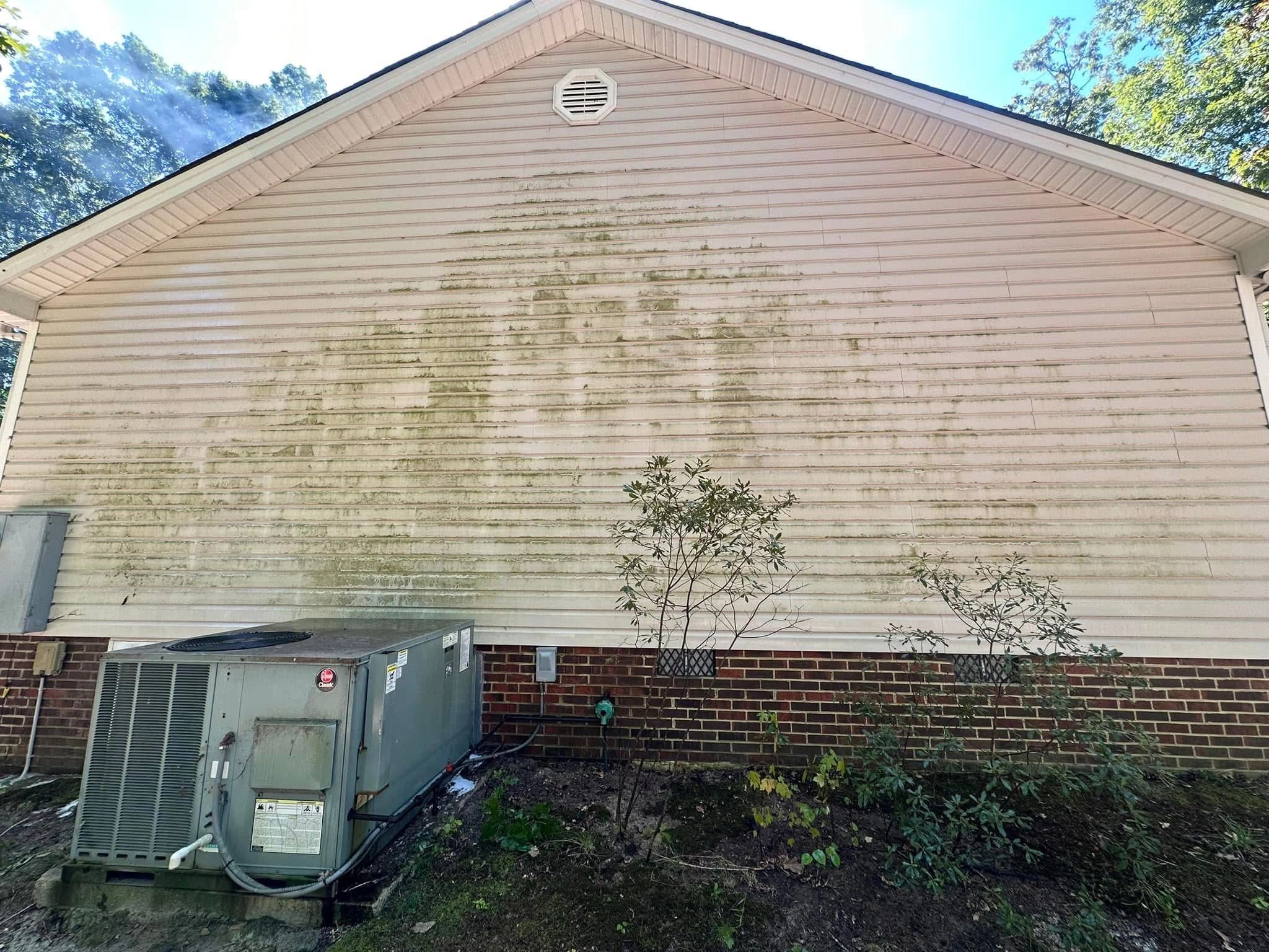 Cleaned residential exterior by Ector Pressure Washing